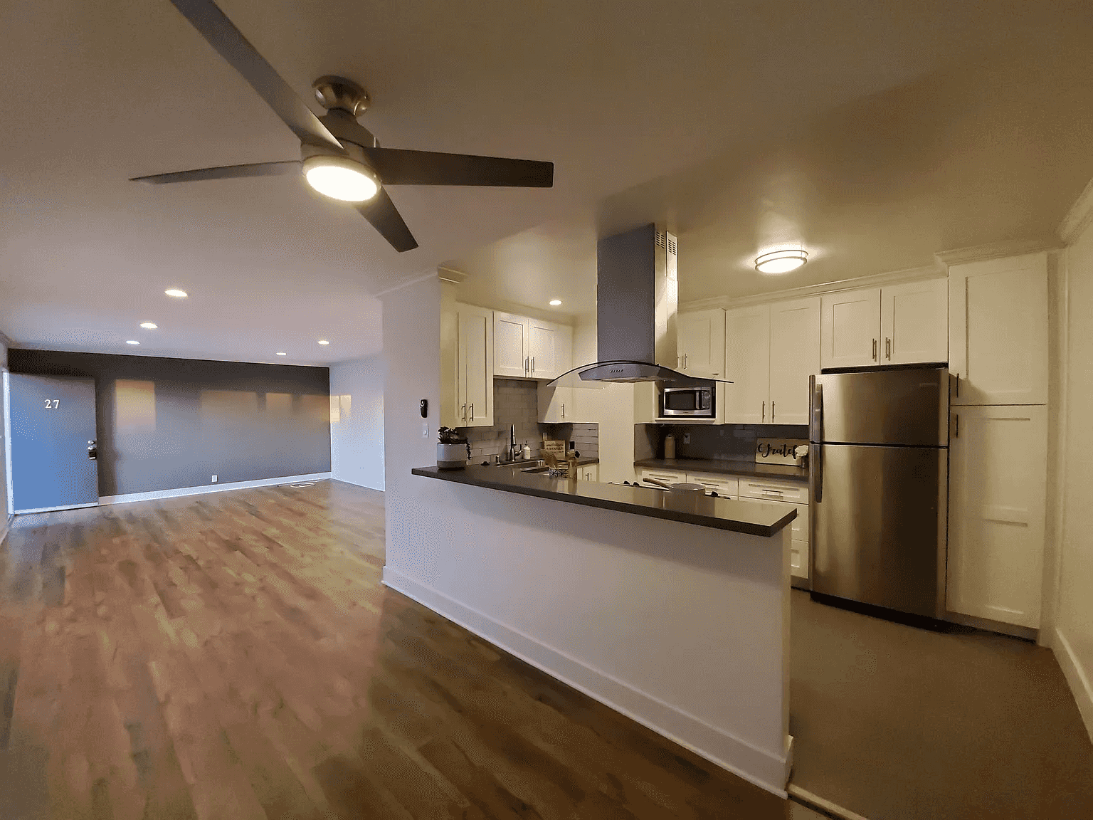 open floor plan living and dining area